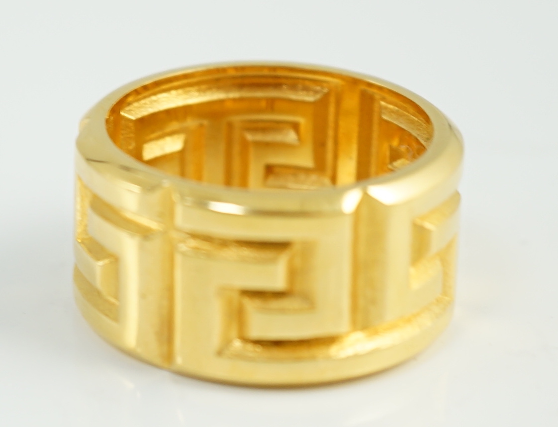 A Versace Greca gentleman's gold plated ring Size X